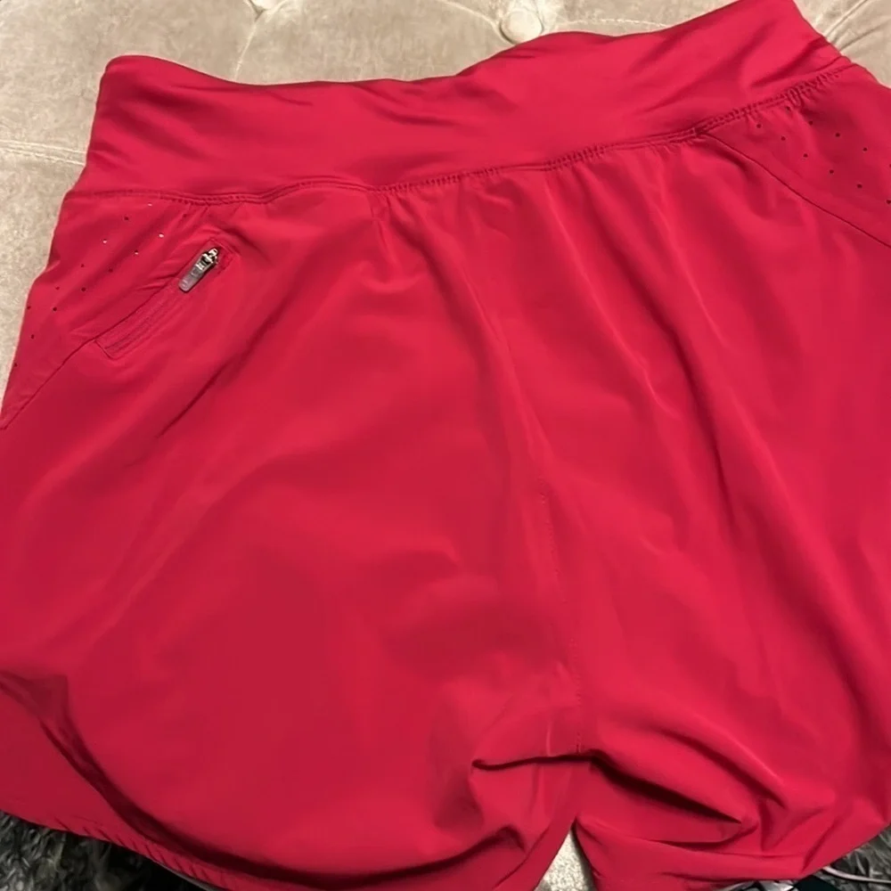 Nike raspberry colored Dri-Fit running shorts, medium, new